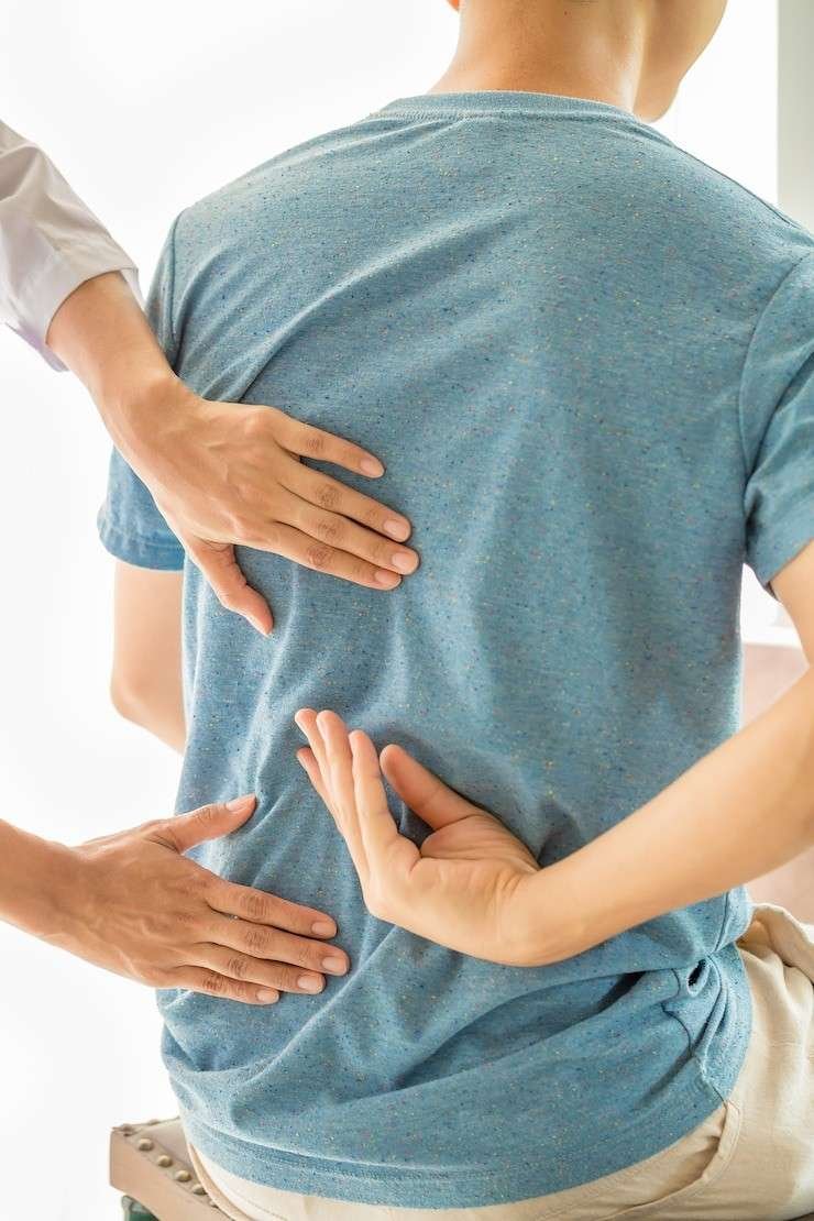 What Types of Physiotherapy Techniques Are Used at GS Physiotherapy for Managing Chronic Lower Back Pain?