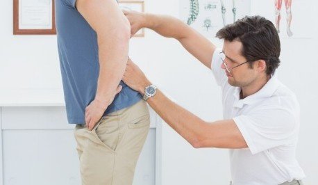 How does physiotherapy at GS Physiotherapy help in managing scoliosis?